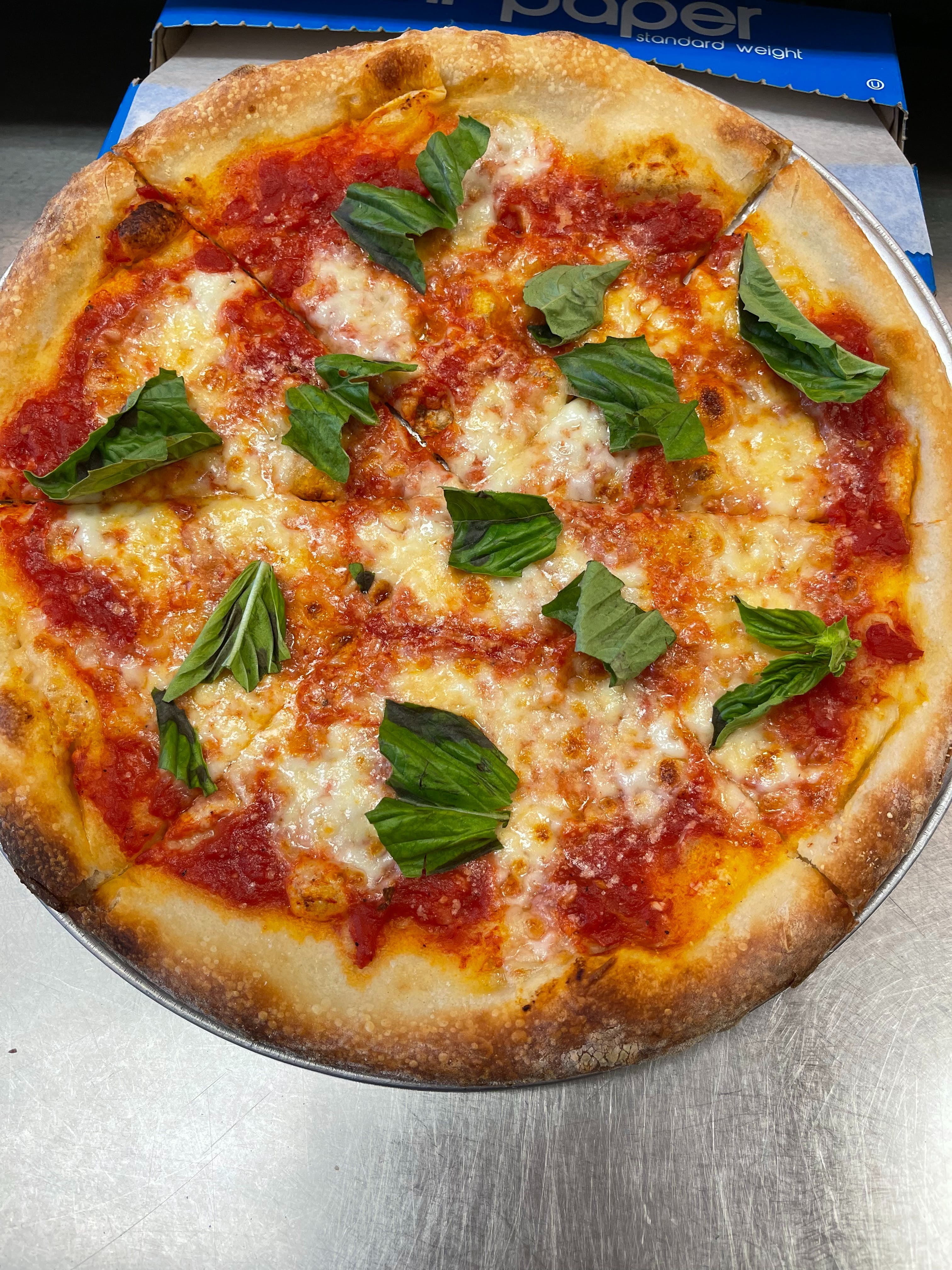 https://slicelife.imgix.net/101875/photos/original/product-margharita-pizza-14773480.jpeg?auto=compress&auto=format