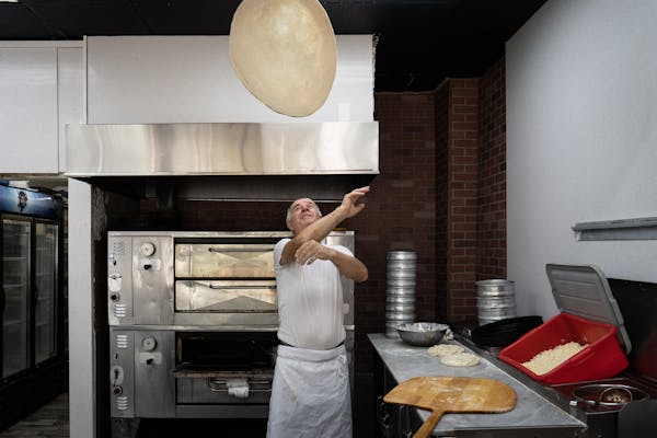 Throwing the dough at Pizza Mia in Staten Island