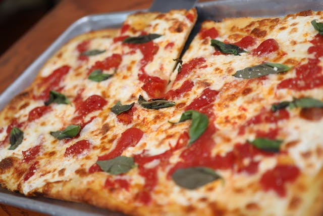 Gino S Pizzeria Menu Bronxville Ny Order Pizza Delivery Slice
