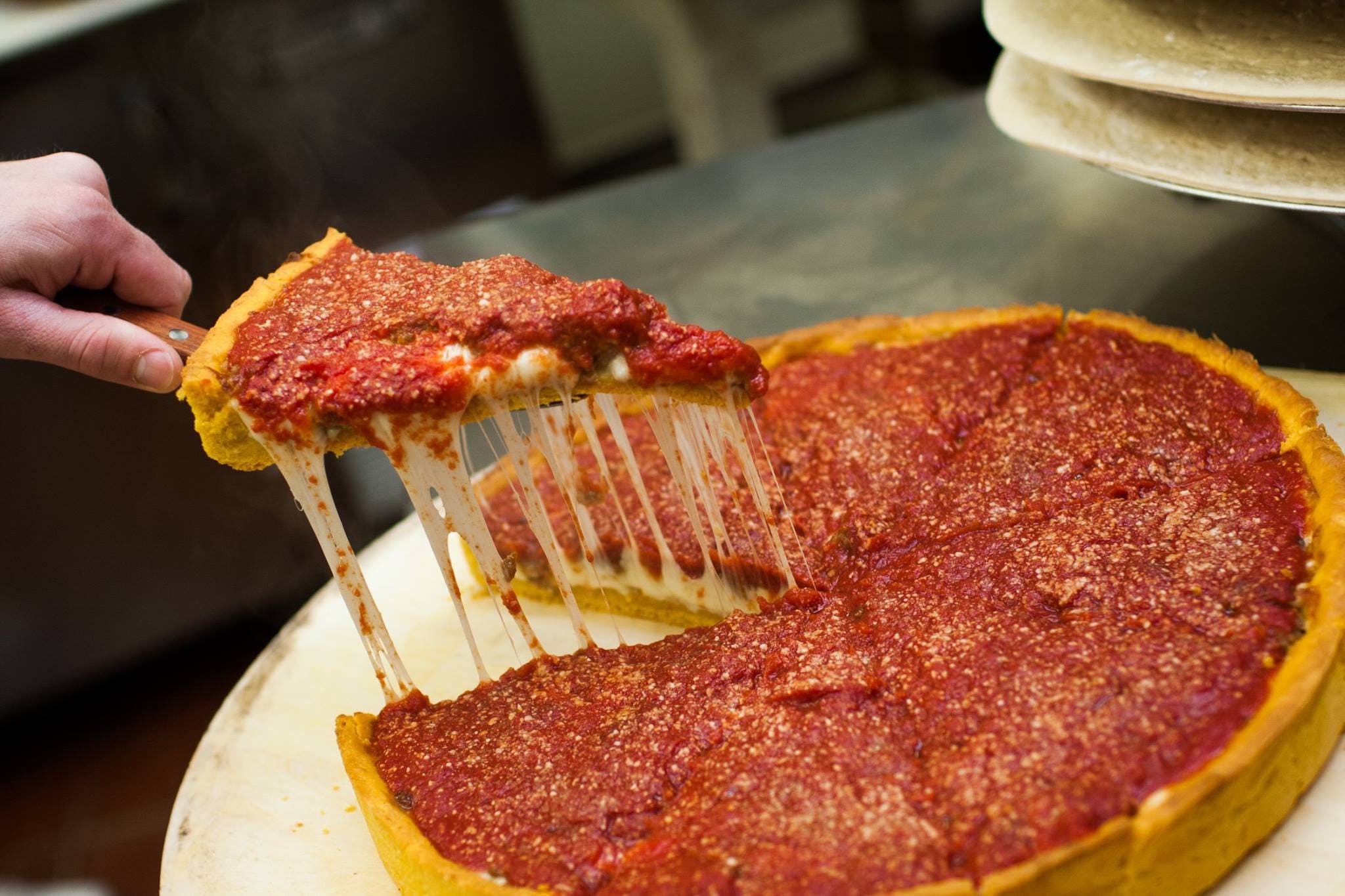 Beggars Pizza Menu Chicago, IL Order Delivery Slice