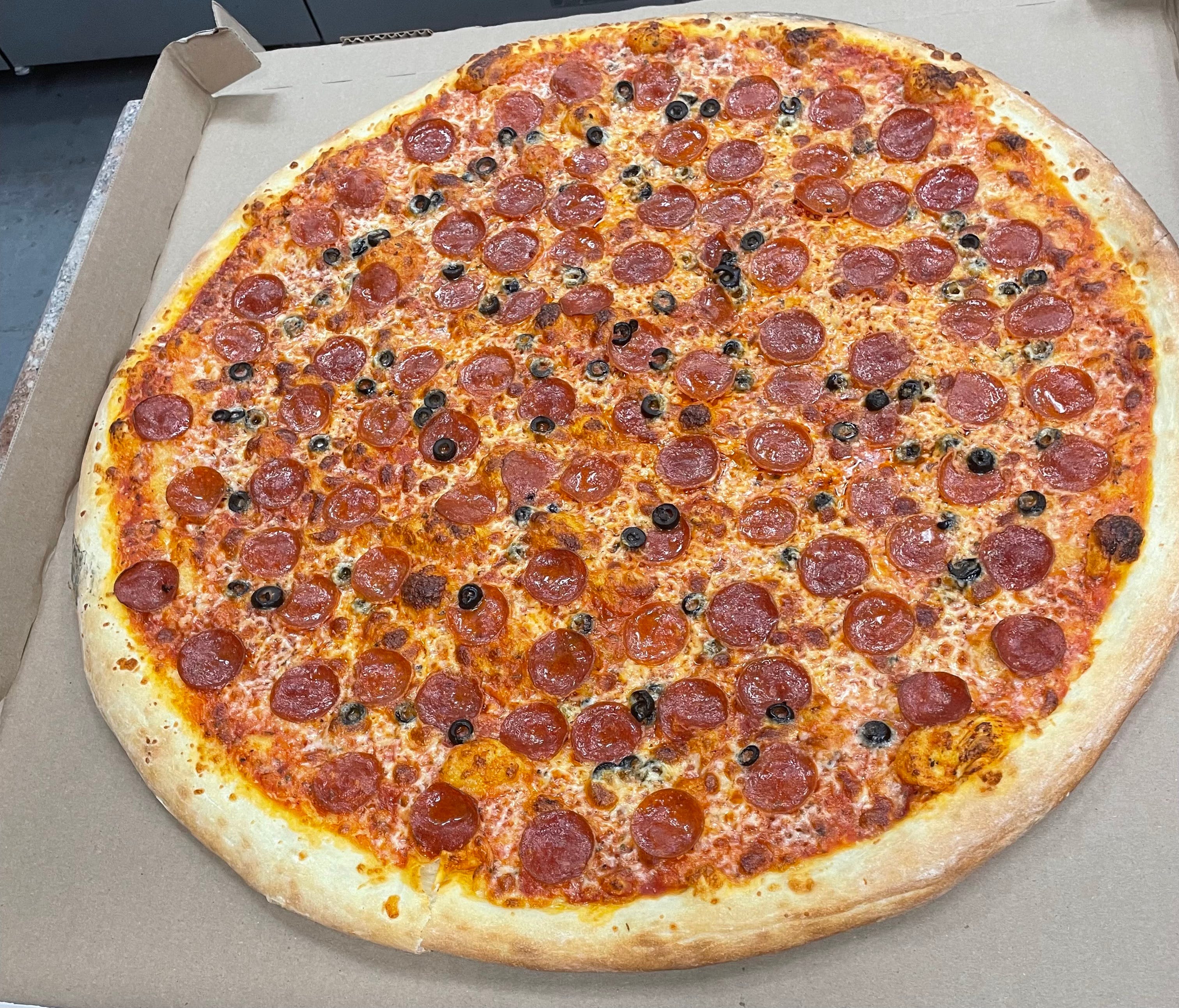 Moe's Giant Pizza hero