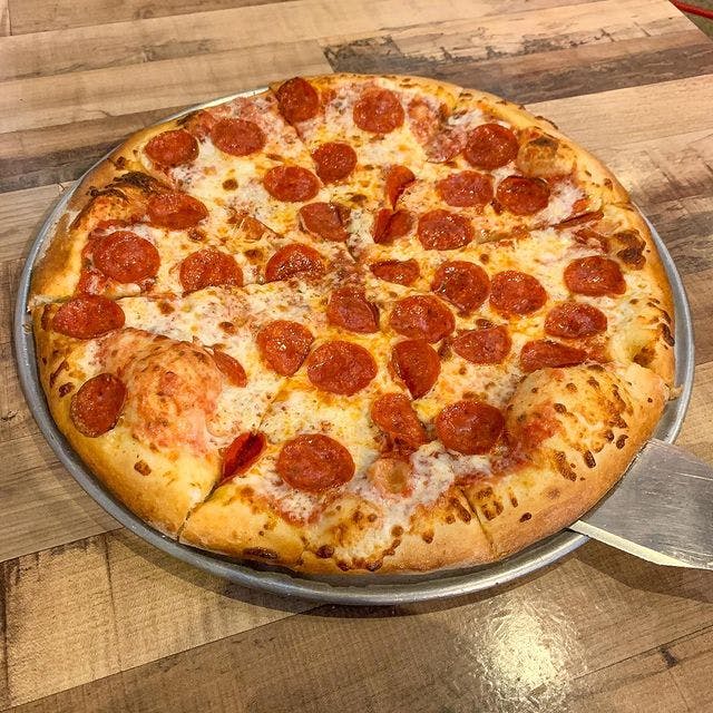 Roppolo s Pizza Menu Austin TX Order For Pickup Slice