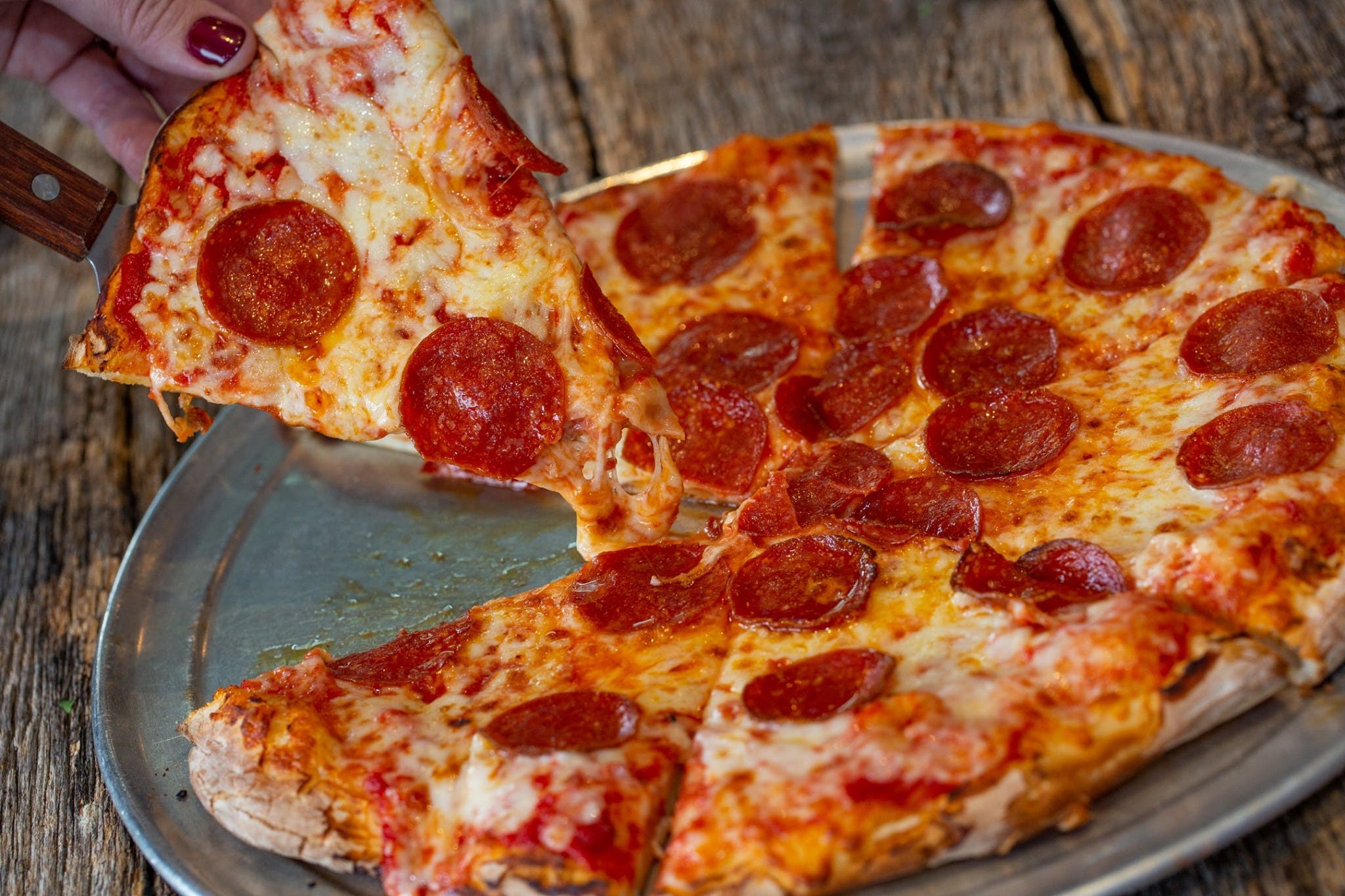 Manhattan Pizza Menu Ashburn, VA Order Delivery Slice